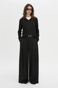 Front-styled view CAMILLA AND MARC Leona V neck sweater in black.