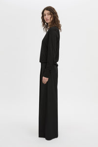 Side view CAMILLA AND MARC Leona V neck sweater in black.