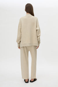 Back View CAMILLA AND MARC Lloyd Cropped Track Pant in cream with a straight leg and elasticated waist.
