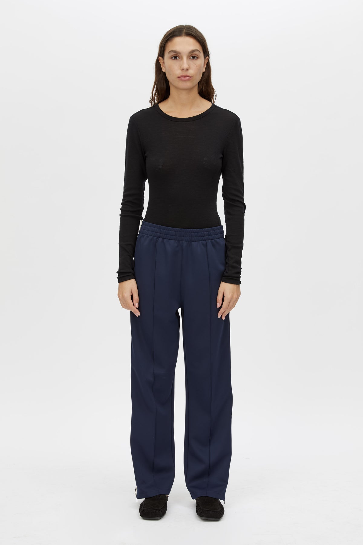 Front view CAMILLA AND MARC Locus Scuba Pant in Midnight with a mid‑rise fit and side‑stripe tape.