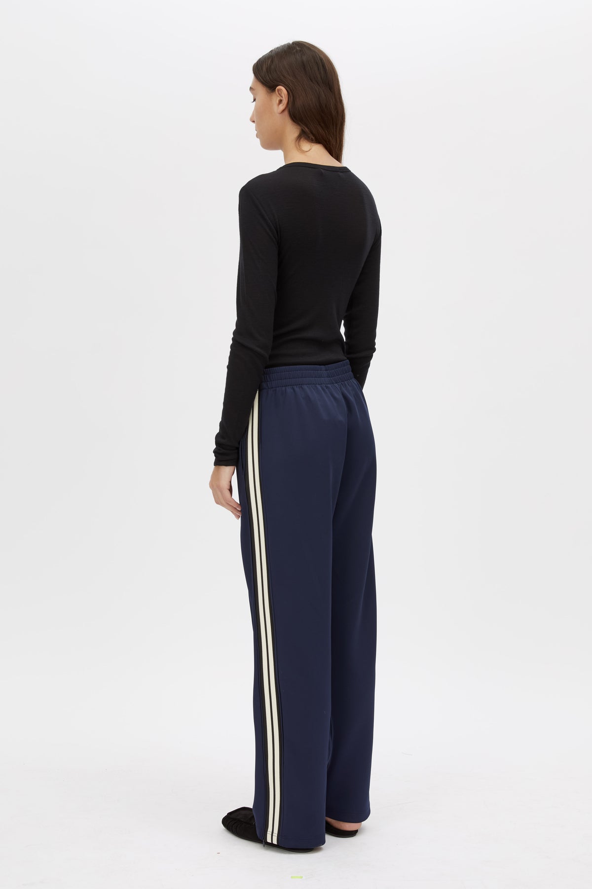 Back view CAMILLA AND MARC Locus Scuba Pant in Midnight with a mid‑rise fit and side‑stripe tape.
