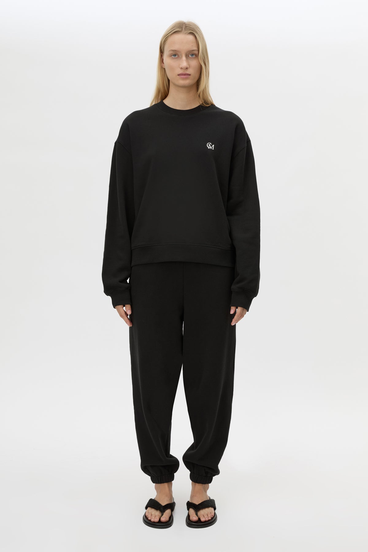 Front view CAMILLA AND MARC Lyra Logo Track Pant in Black and White styled with Lyra Tracksuit Top.