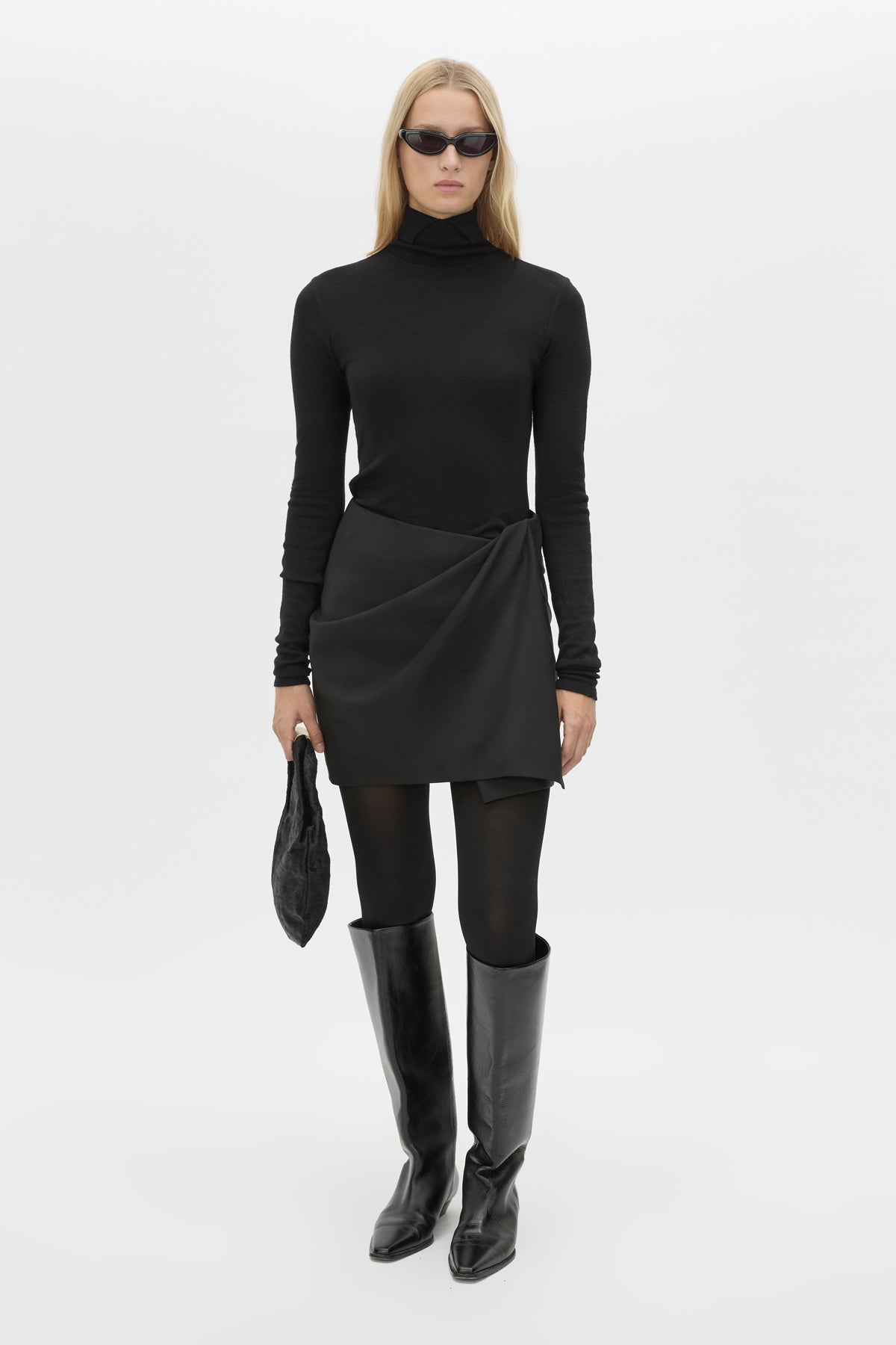 Front view CAMILLA AND MARC Mackinley Mini Wrap Skirt in Black with a draped low‑rise silhouette.