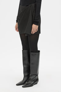 Cropped view CAMILLA AND MARC Mackinley Mini Wrap Skirt in Black with a draped low‑rise silhouette.
