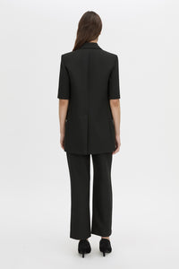 Back view CAMILLA AND MARC Mackinley short sleeve blazer in black.