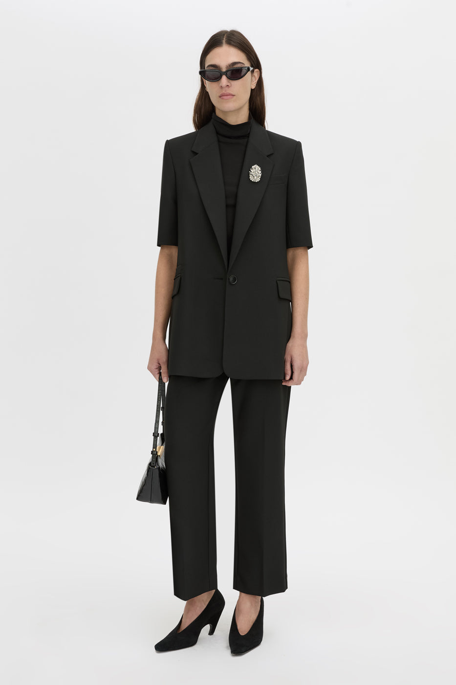 Front styled view CAMILLA AND MARC Mackinley short sleeve blazer in black.