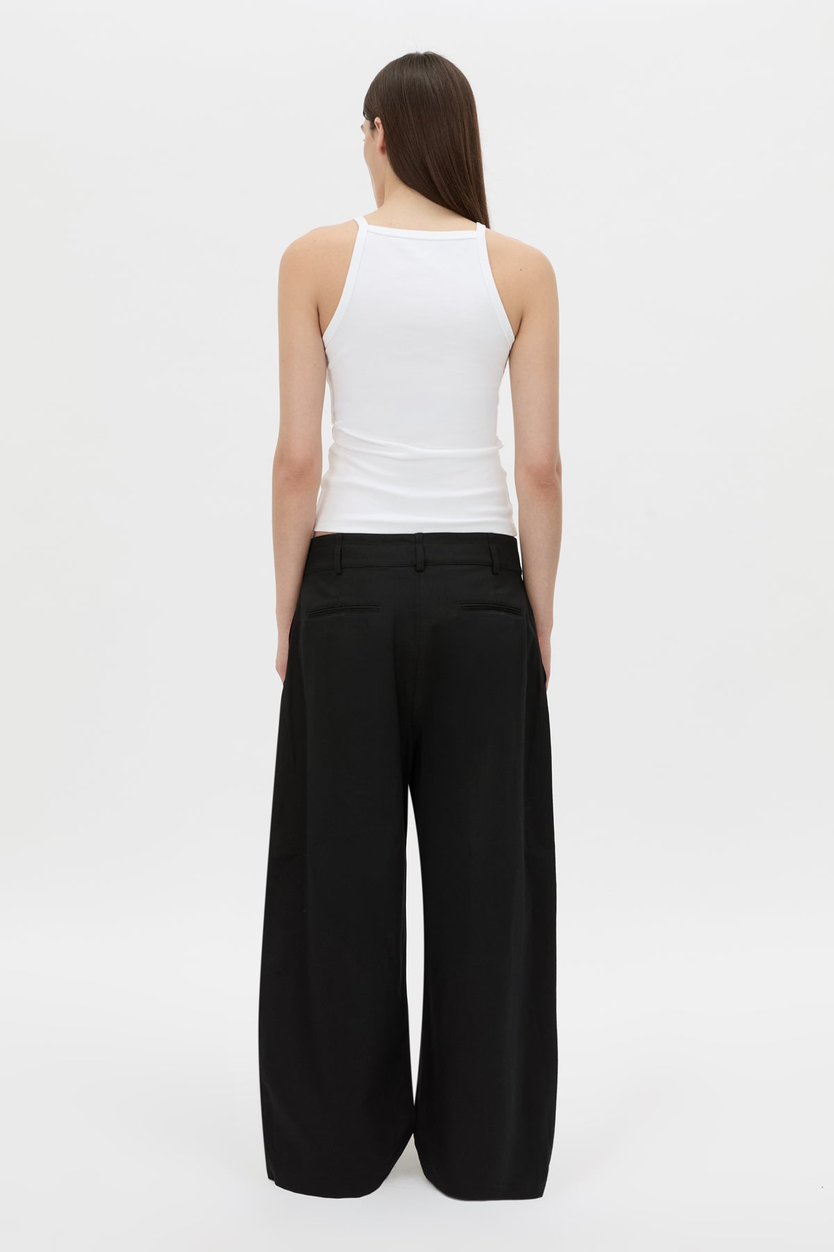 Back view CAMILLA AND MARC Magnolia Drill Pant in black with centre front and back pleats.