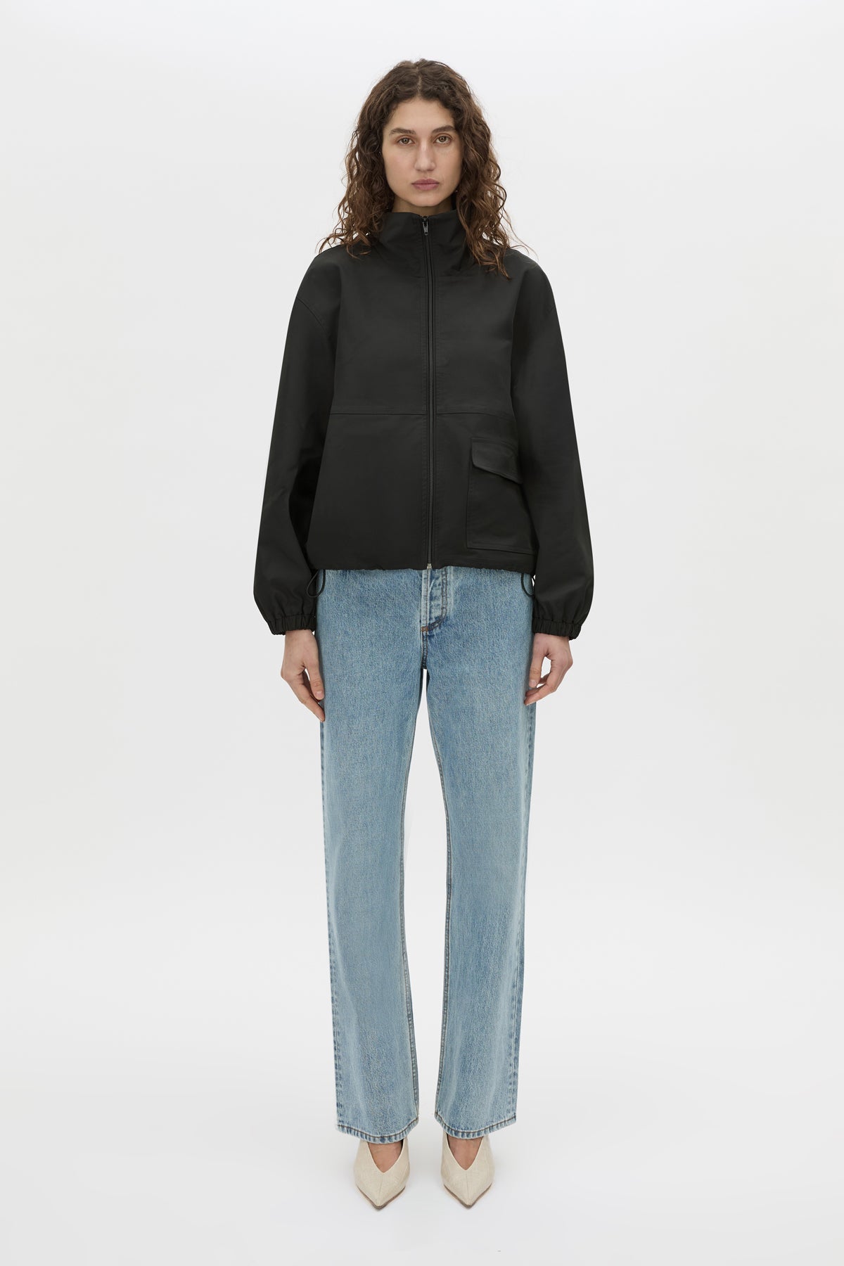 Front-styled-2 view CAMILLA AND MARC Mahdavi funnel neck jacket in black.