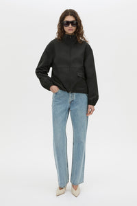 Front-styled view CAMILLA AND MARC Mahdavi funnel neck jacket in black.