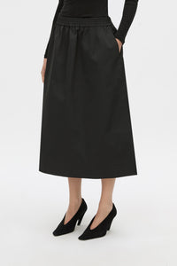 Cropped view CAMILLA AND MARC Mahdavi midi skirt in black.