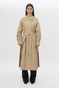 Front View Styled - CAMILLA AND MARC Mahdavi oversized tan trench coat with side splits and belt.