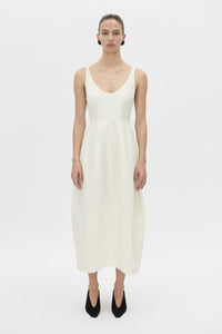 Front-styled view CAMILLA AND MARC Mala midi dress in cream.