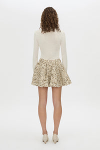 Back view CAMILLA AND MARC Manara mini skirt in tan.
