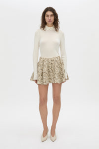 Front-styled view CAMILLA AND MARC Manara mini skirt in tan.