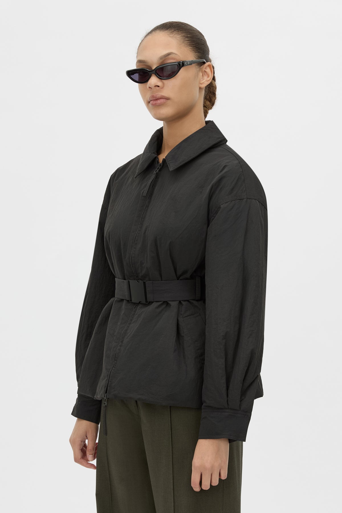 Detail View - CAMILLA AND MARC Manon Padded Belted Jacket in black with hammered textured fabrication. 