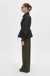 Side View - CAMILLA AND MARC Manon Padded Belted Jacket in black with hammered textured fabrication. 