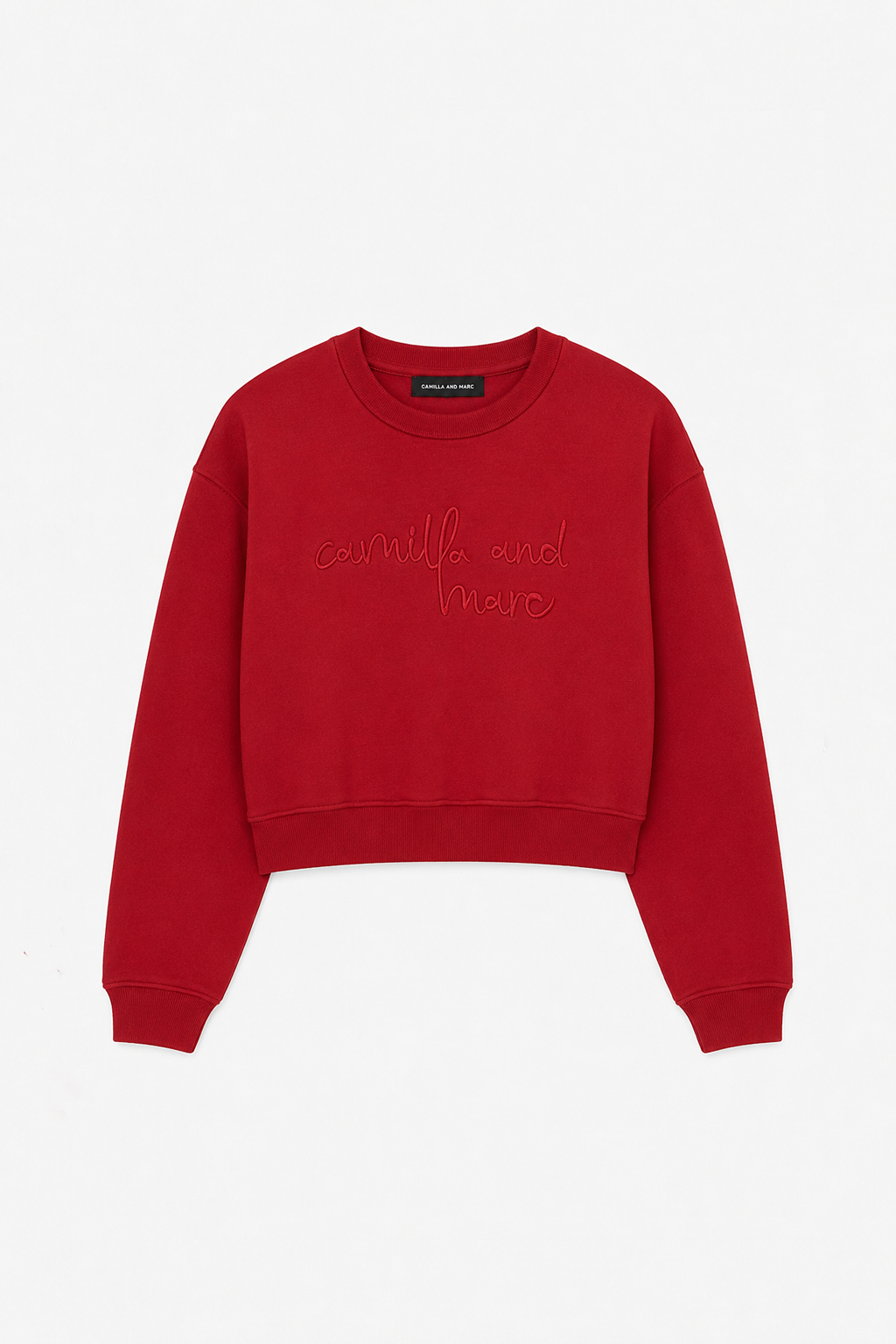 Ghost view CAMILLA AND MARC Maren Crop Tracksuit Top in mid red with raised logo embroidery.