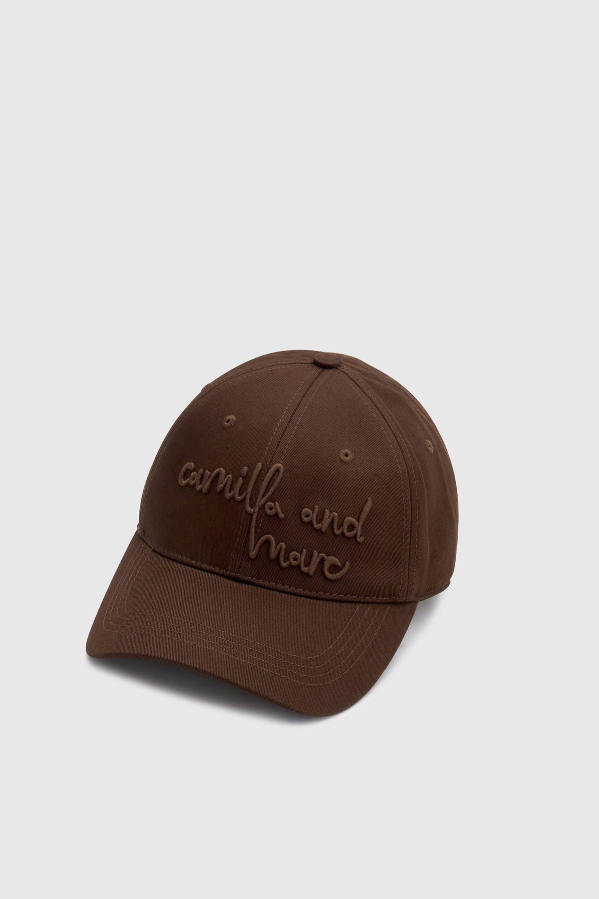 Ghost view CAMILLA AND MARC Maren Embroidered Cap in Chocolate Brown with front embroidered artwork.