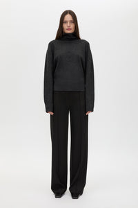 Front view CAMILLA AND MARC Margot Turtleneck Knit Sweater in charcoal grey with ribbed collar and hems.