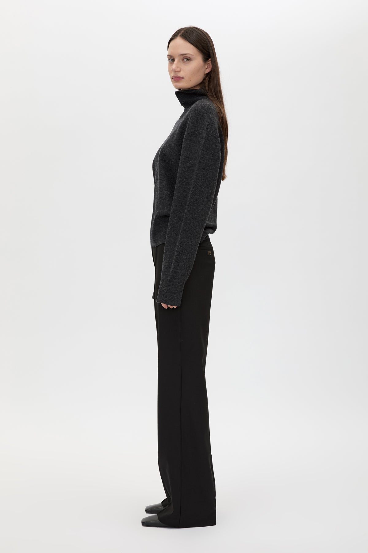 Side view CAMILLA AND MARC Margot Turtleneck Knit Sweater in charcoal grey with ribbed collar and hems.