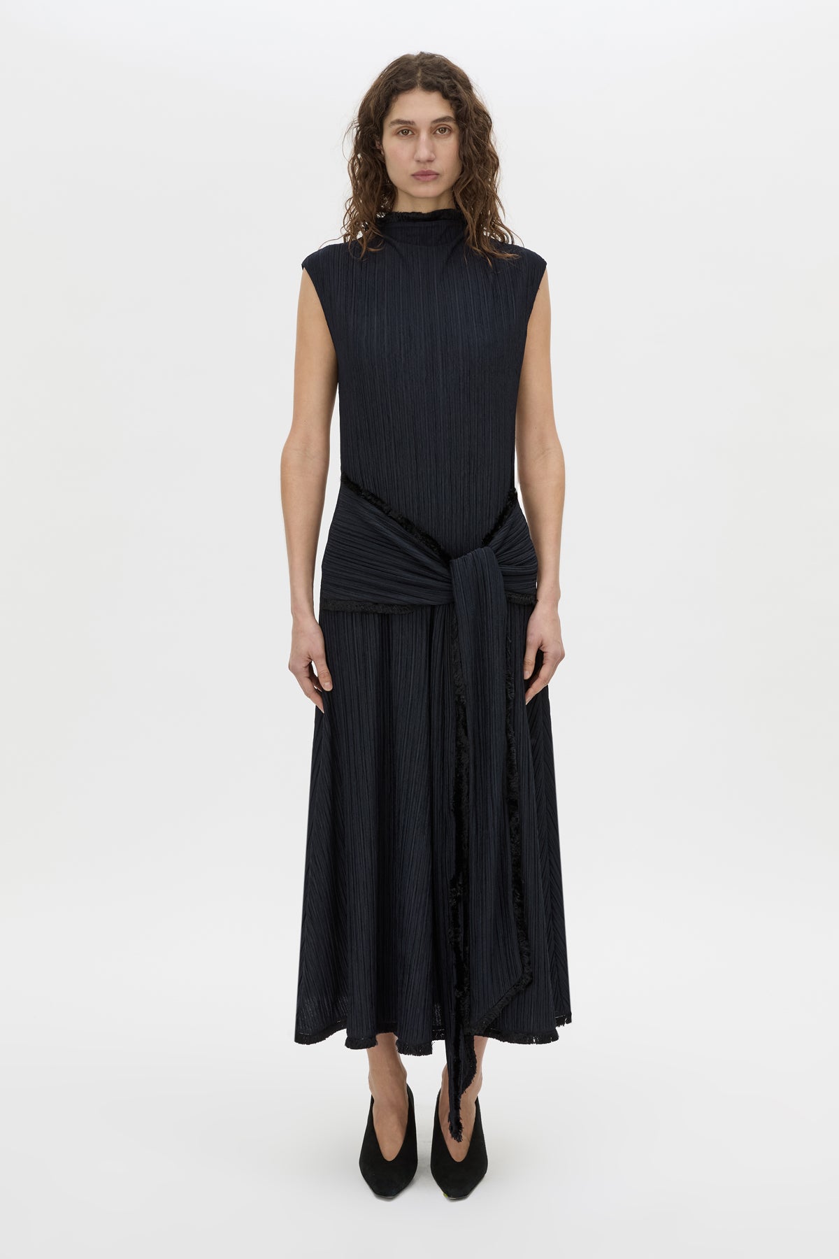 Front-styled view CAMILLA AND MARC Mavis Midi Dress in midnight with waist tie detail.