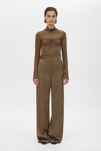 Front styled view CAMILLA AND MARC Maxim Manstyle Pant in Cinnamon Brown Pinstripe, featuring a tailored silhouette.