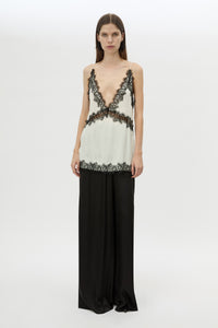 Front styled view CAMILLA AND MARC Mirage Lace Trim Top in Cream with V‑neck cami silhouette, and lace border trim.