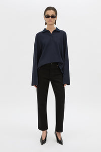 Front-styled view CAMILLA AND MARC cotton Moreno Long Sleeve Polo Top in navy with quarter external button placket.