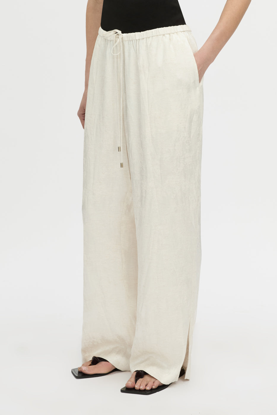 Cropped view CAMILLA AND MARC mid-rise Naidee Satin Relaxed Pant in ivory white with an elasticated gathered waistband.