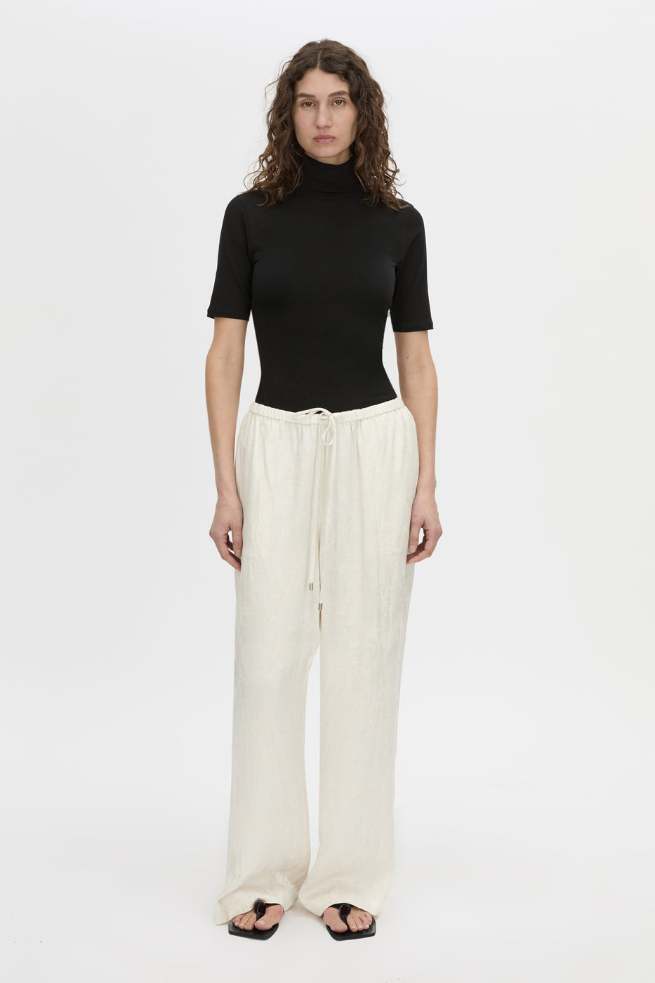 Front view CAMILLA AND MARC mid-rise Naidee Satin Relaxed Pant in ivory white with an elasticated gathered waistband.