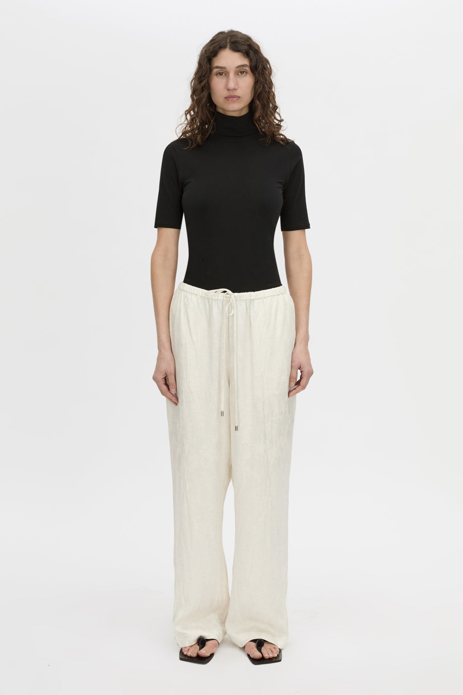 Front view CAMILLA AND MARC mid-rise Naidee Satin Relaxed Pant in ivory white with an elasticated gathered waistband.