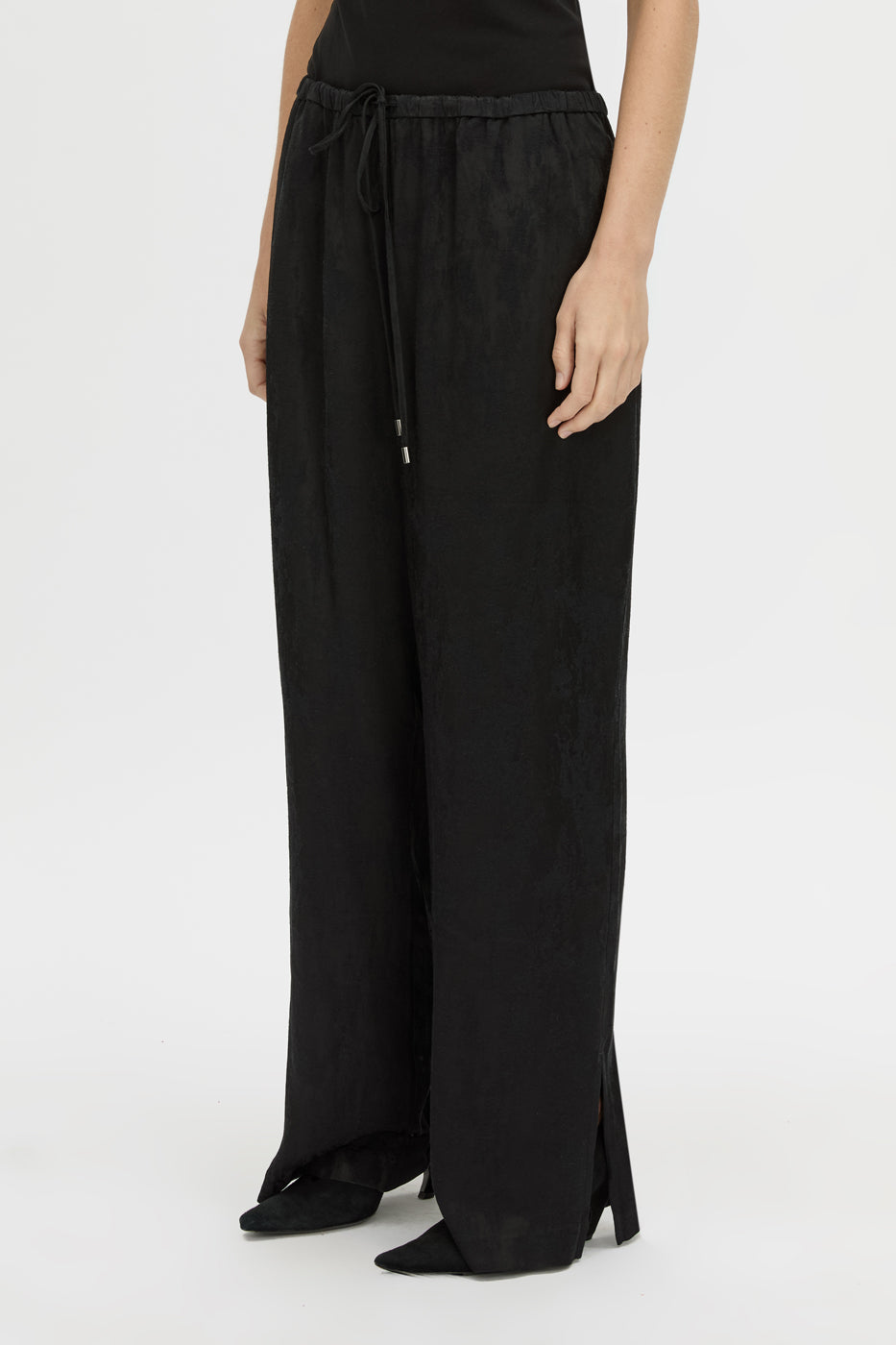 Cropped view CAMILLA AND MARC mid-rise Naidee Satin Relaxed Pant in black with an elasticated gathered waistband.