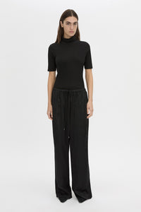 Front view CAMILLA AND MARC mid-rise Naidee Satin Relaxed Pant in black with an elasticated gathered waistband.