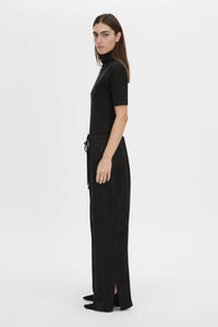 Side view CAMILLA AND MARC mid-rise Naidee Satin Relaxed Pant in black with an elasticated gathered waistband.
