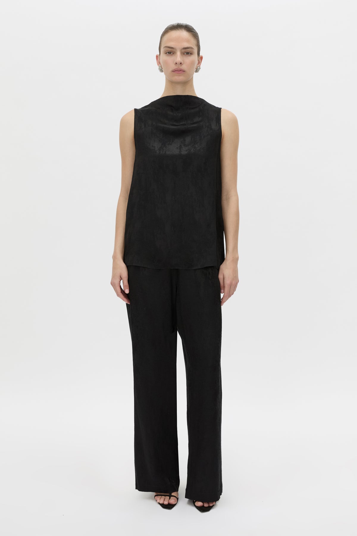 Styled view CAMILLA AND MARC mid-rise Naidee Satin Relaxed Pant in black with an elasticated gathered waistband.