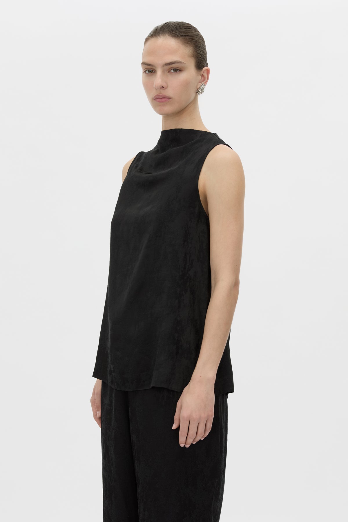 Cropped view CAMILLA AND MARC Naidee Satin Sleeveless Top in black with sleeveless shell design in satin fabrication.