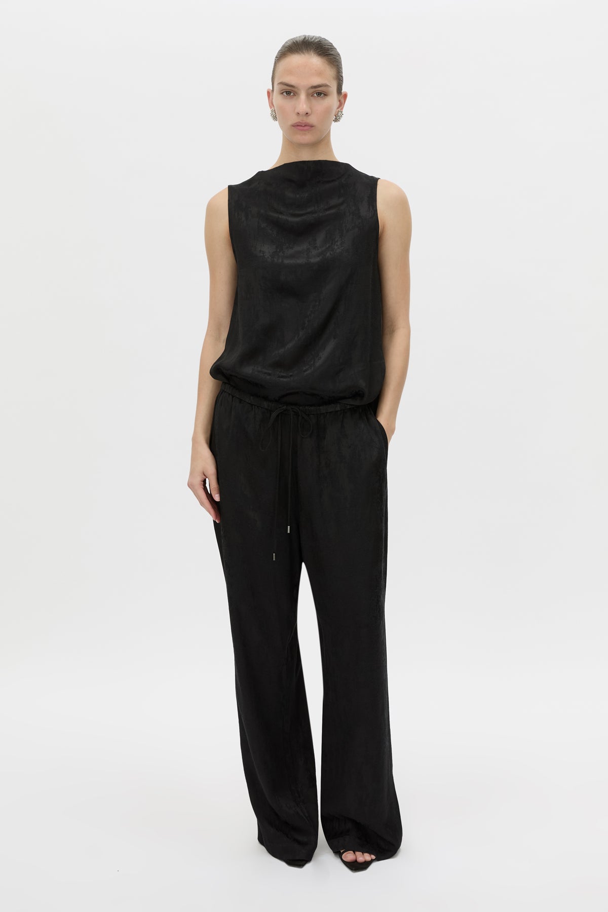 Front view CAMILLA AND MARC Naidee Satin Sleeveless Top in black with sleeveless shell design in satin fabrication.