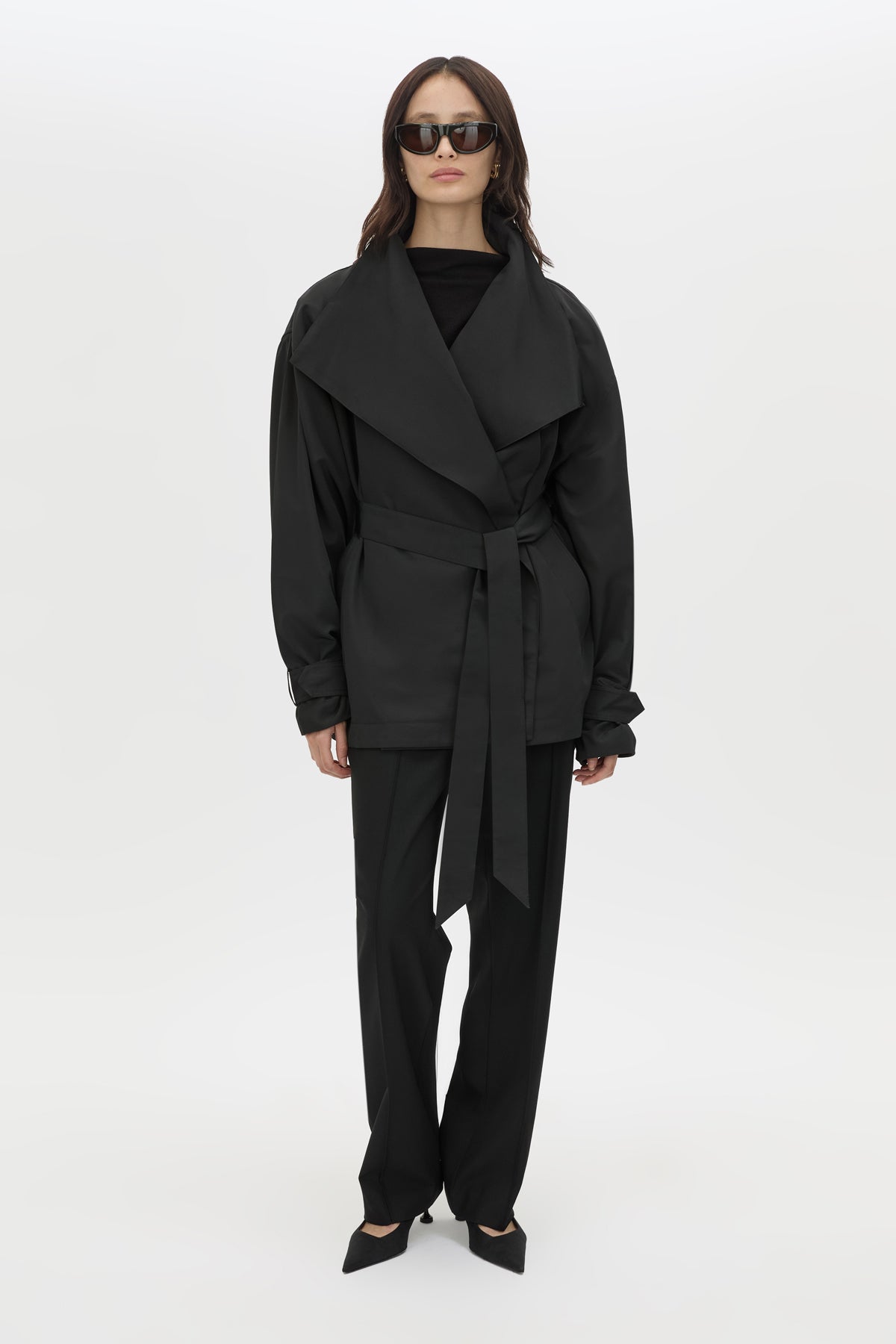 Front view CAMILLA AND MARC Nasir Cropped Jacket in Black with high‑neck, double‑breasted wrap design.