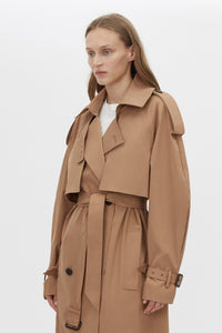 Close up view CAMILLA AND MARC Nelle trench coat in toffee twill fabrication with an oversized fit.