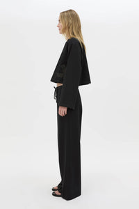 Side view CAMILLA AND MARC Niami Jersey Pant in black with a relaxed straight‑leg fit.