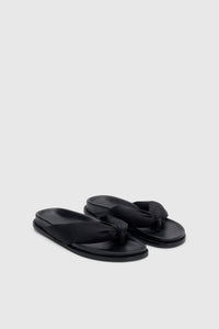 Three-quarter view CAMILLA AND MARC Nina Slide Sandal in Black with padded satin straps.
