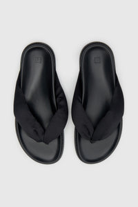 Top view CAMILLA AND MARC Nina Slide Sandal in Black with padded satin straps.
