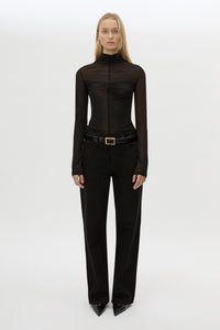 Front styled view CAMILLA AND MARC Novel Long Sleeve Stocking Top in Black with ruched bust detail.