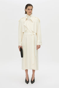 Front view CAMILLA AND MARC Ontario Trench Coat in cream with contrast knot epaulette detailing.