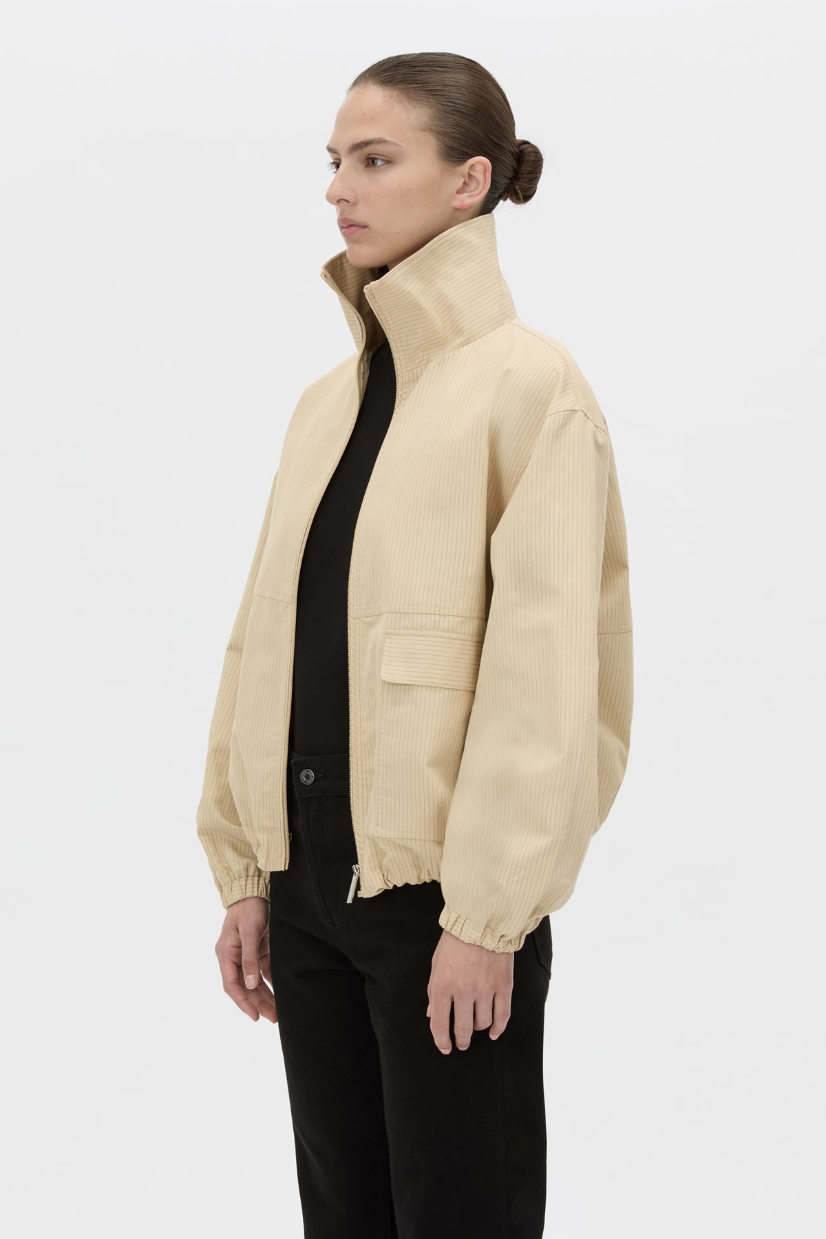 Cropped view CAMILLA AND MARC Oren Funnel Neck Jacket in ochre stripe with CAMILLA AND MARC monogram embroidery.