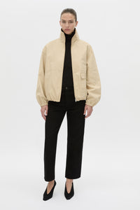 Styled view CAMILLA AND MARC Oren Funnel Neck Jacket in ochre stripe with CAMILLA AND MARC monogram embroidery.
