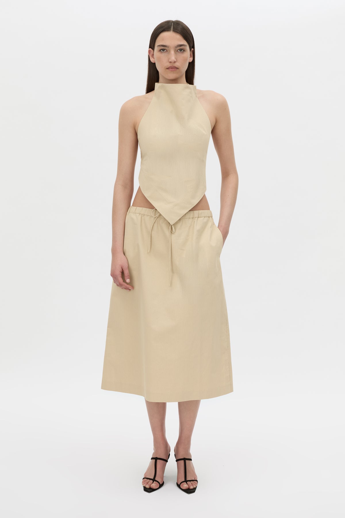 Front-styled view CAMILLA AND MARC Oren Stripe Midi Skirt in ochre stripe with an adjustable mid‑rise waistline.