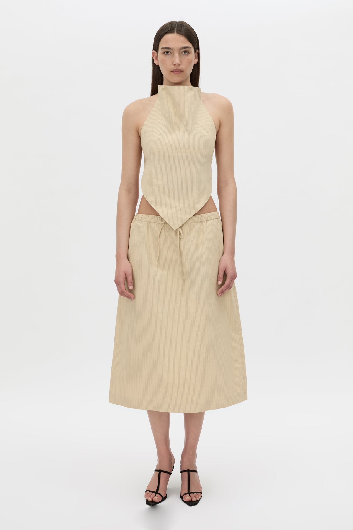Styled view CAMILLA AND MARC Oren Stripe Midi Skirt in ochre stripe with an adjustable mid‑rise waistline.