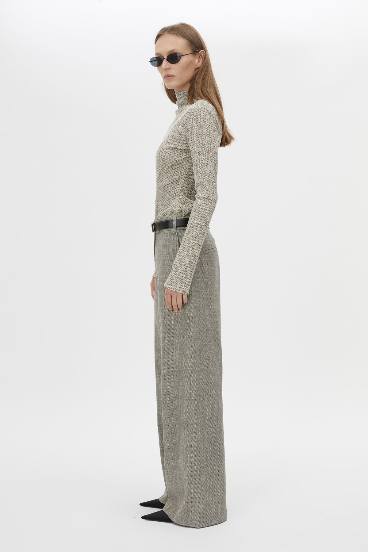 Side view CAMILLA AND MARC Orsa Top in Beige with a textured jersey finish and long‑sleeve silhouette.