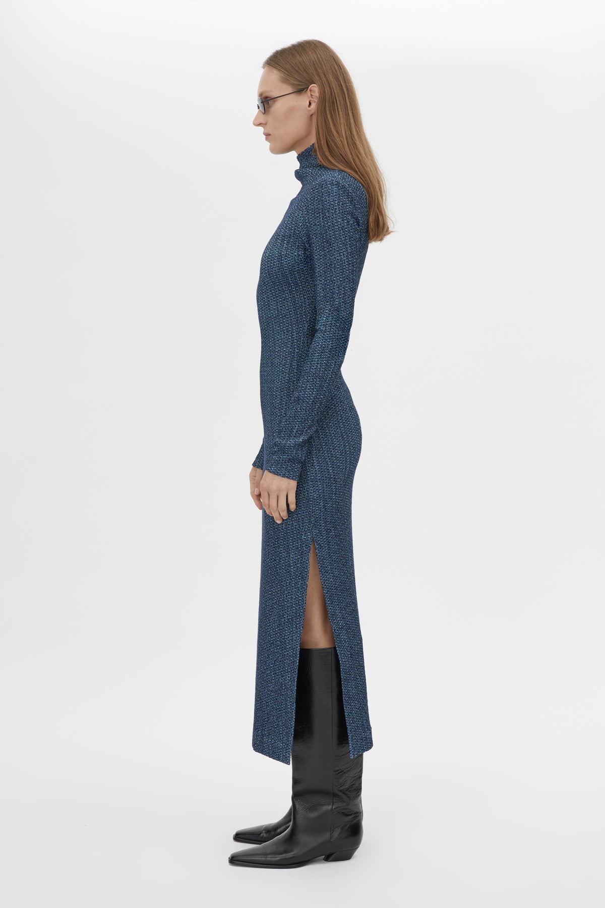 Side view CAMILLA AND MARC Orsa Midi Dress in Navy with long sleeves and a textured jersey finish.